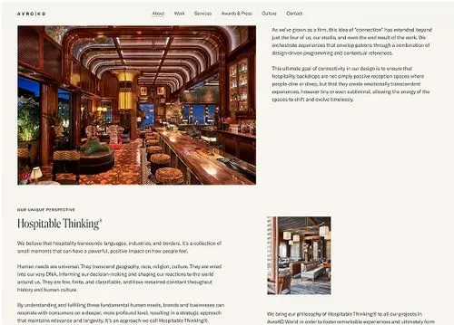 Elegant, warmly lit bar interior with polished wooden counters, leather stools, plush seating, and decorative lighting, evoking a cozy, upscale atmosphere.