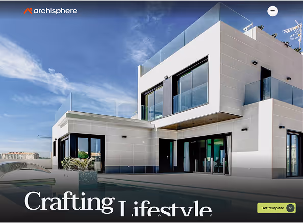 Modern white two-story house with large glass windows and balconies under a blue sky.